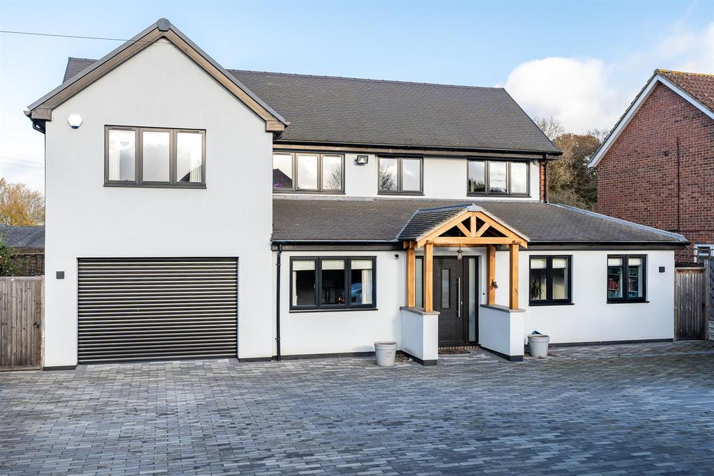 Professional home with block paving driveway